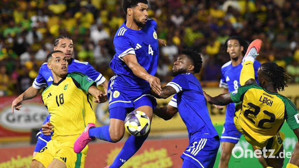 Keine Tore, aber großer Jubel: Curaçao (blaue Trikots) ist bei der WM dabei. Bild: Collin Reid/AP/dpa