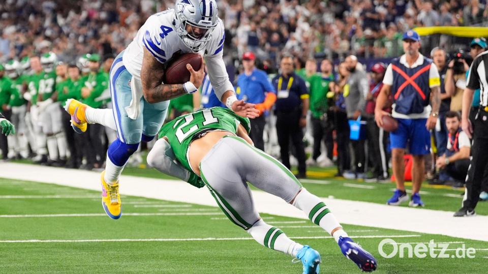Cowboys-Quarterback Dak Prescott gelingt ein spektakulärer Touchdown. Bild: Tony Gutierrez/AP/dpa