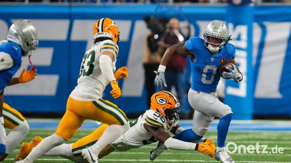 Duell an Thanksgiving: Die Detroit Lions (blaue Trikots) im Duell mit den Green Bay Packers. Bild: Paul Sancya/AP/dpa