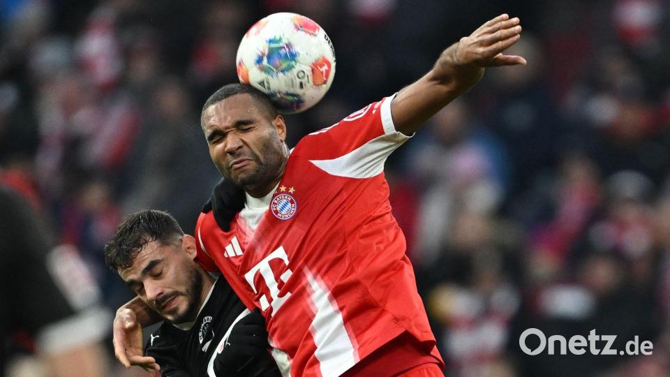 Harte Arbeit für die Bayern, hier Jonathan Tah (r) gegen Pauli-Angreifer Daniel Sinani. Bild: Sven Hoppe/dpa
