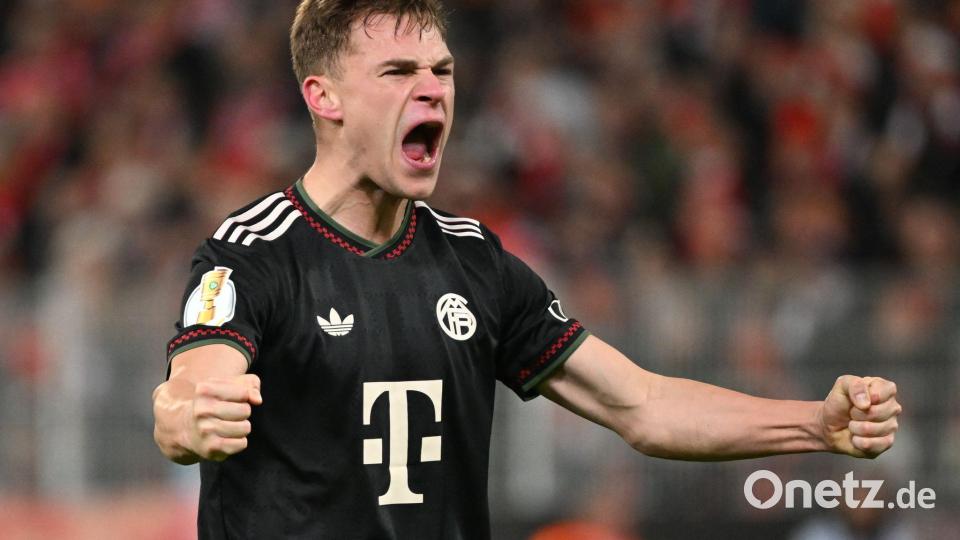 Kimmich und die Bayern bejubelten den gewonnenen Pokalfight. Bild: Soeren Stache/dpa