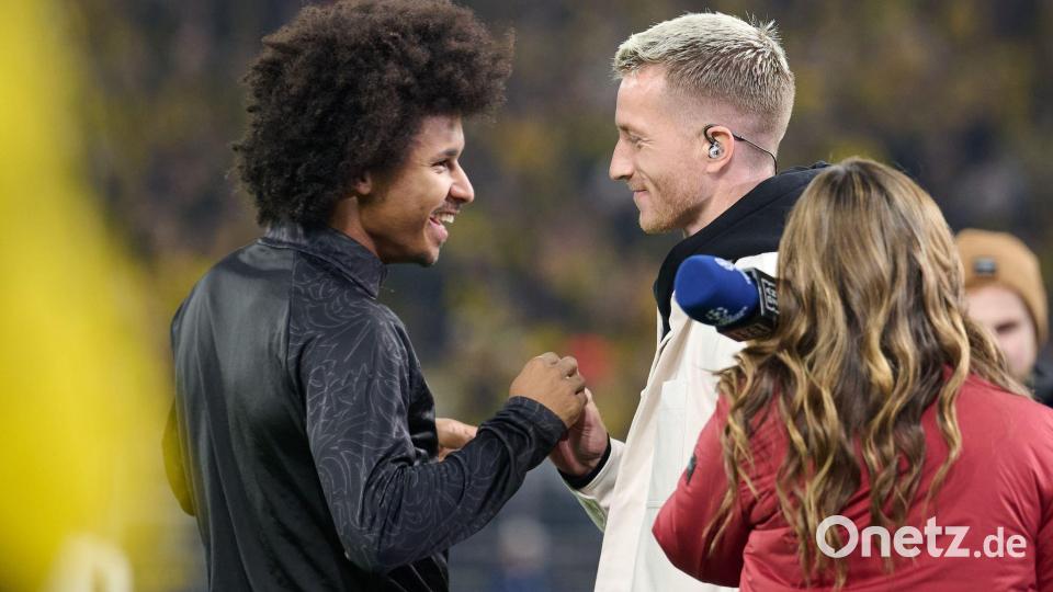 Begeistert gefeiert von Fans und ehemaligen Mitspielern: Marco Reus (r.) Bild: Bernd Thissen/dpa