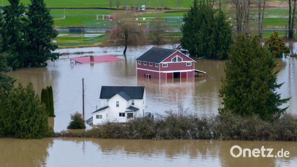 Flussebenen im US-Bundesstaat Washington sind nach schweren Regenfällen überflutet. Bild: Stephen Brashear/AP/dpa