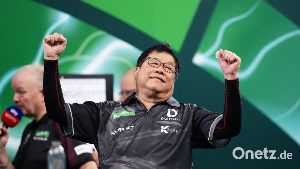 Paul Lim feiert seinen Coup in London. Bild: John Walton/PA Wire/dpa