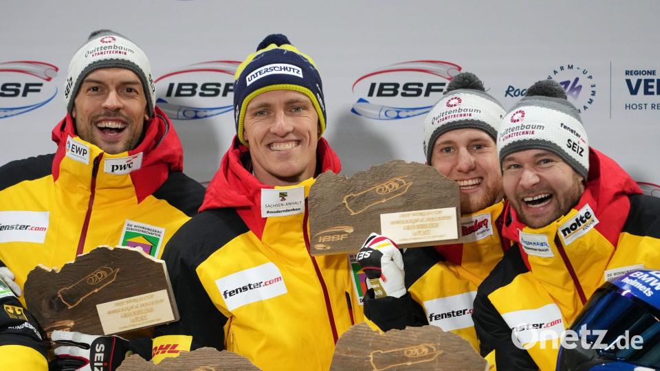 Johannes Lochner (r) kommt im Olympia-Winter immer besser in Fahrt, gewinnt im Viererbob gleich beide Rennen. Bild: Andrew Medichini/AP/dpa