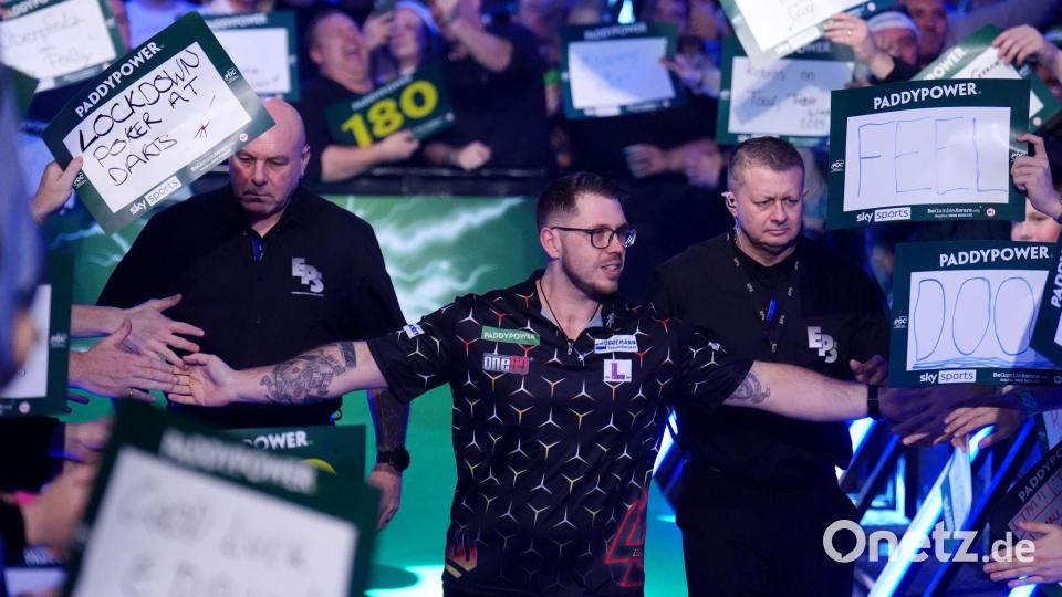 Läuft erstmals im Ally Pally ein: Lukas Wenig. Bild: John Walton/PA Wire/dpa