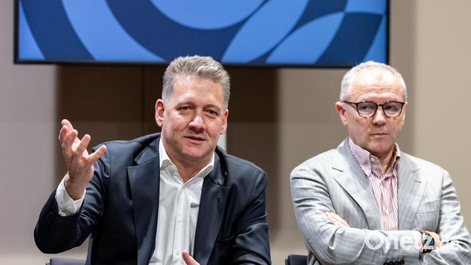 Der Audi-Boss und der Formel-1-Chef Seite an Seite. Bild: Daniel Karmann/dpa