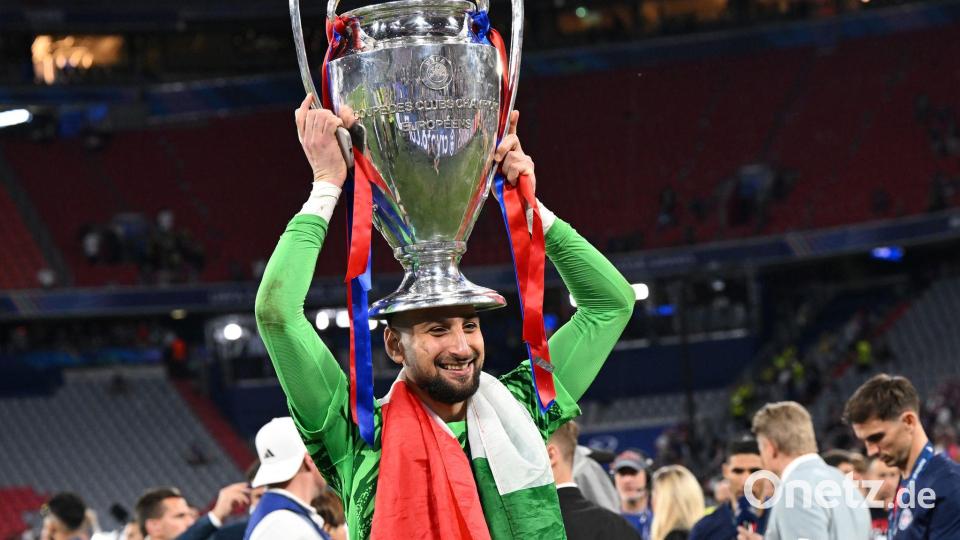 Krönung: Gianluigi Donnarumma mit der Champions-League-Trophäe. Bild: Sven Hoppe/dpa