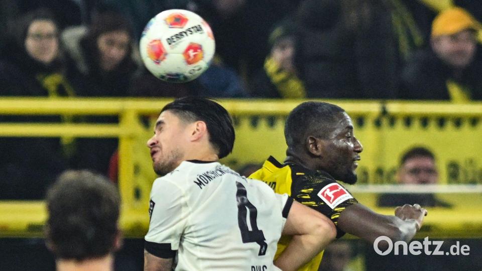 Gladbacher und Dortmunder lieferten sich viele packende Zweikämpfe. Bild: Bernd Thissen/dpa