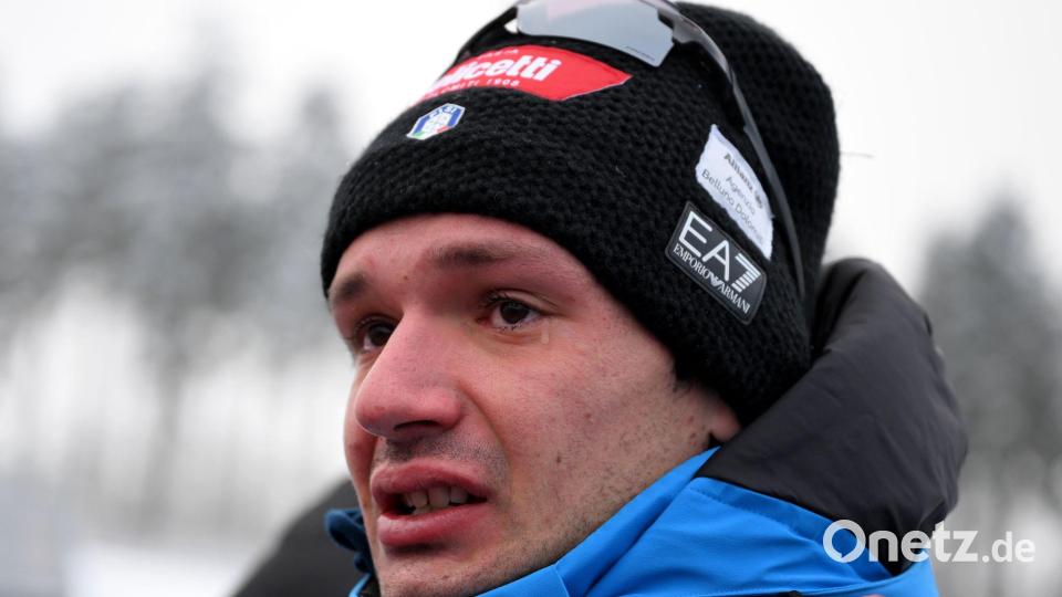 Bei der Erinnerung an seinen Freund weint Tommaso Giacomel. Bild: Hendrik Schmidt/dpa