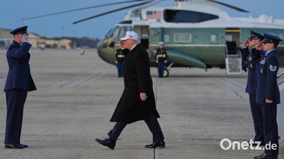 US-Präsident Donald Trump (M) kommt auf der Joint Base Andrews an. Bild: Evan Vucci/AP/dpa