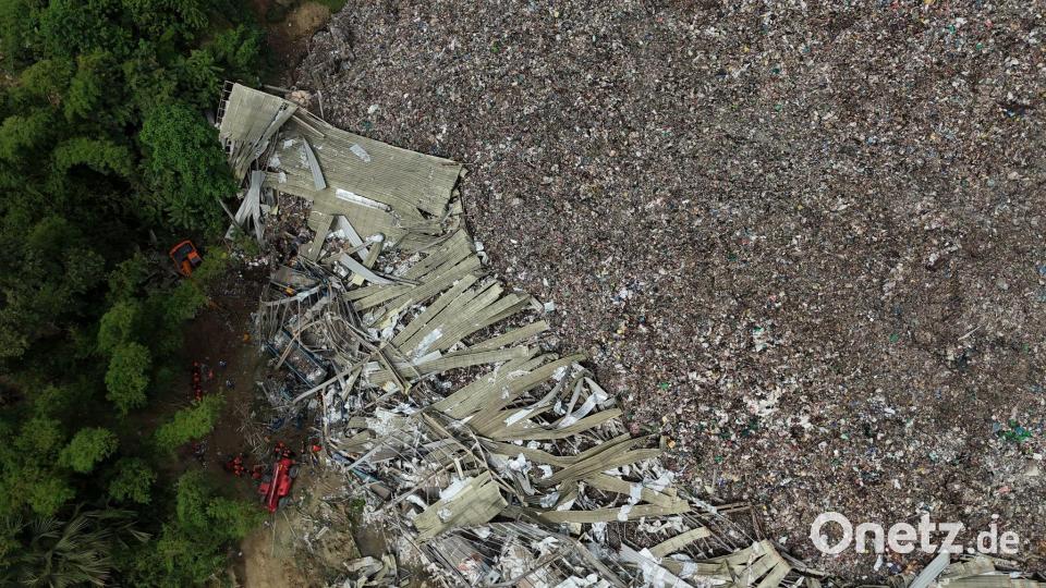 Der Müllberg, unter dem die Menschen begraben wurden, ist gewaltig. Bild: Jacqueline Hernandez/AP/dpa