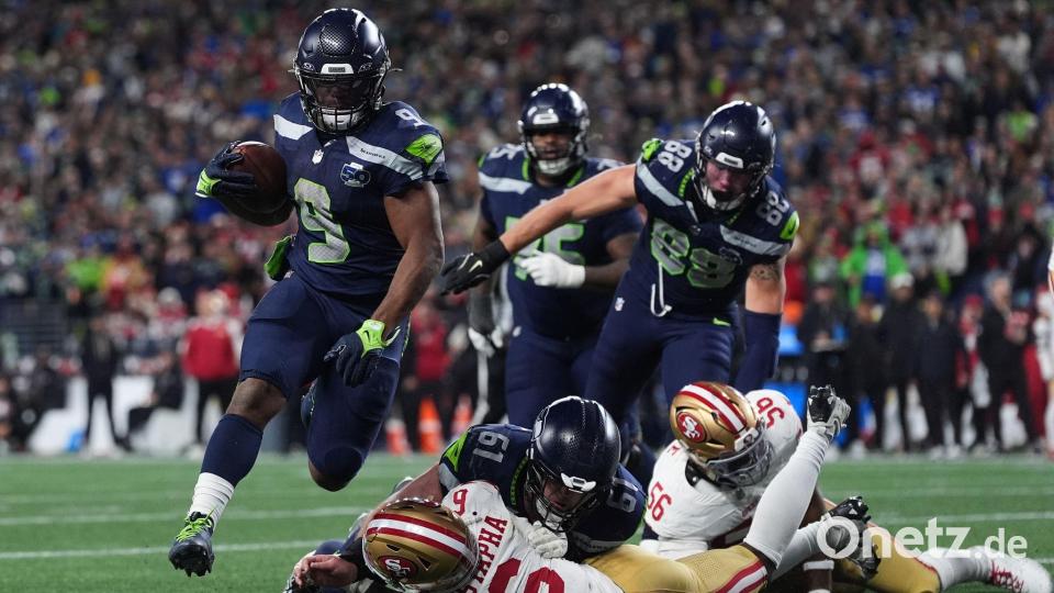 Drei Touchdowns für Kenneth Walker III (9). Bild: Lindsey Wasson/AP/dpa