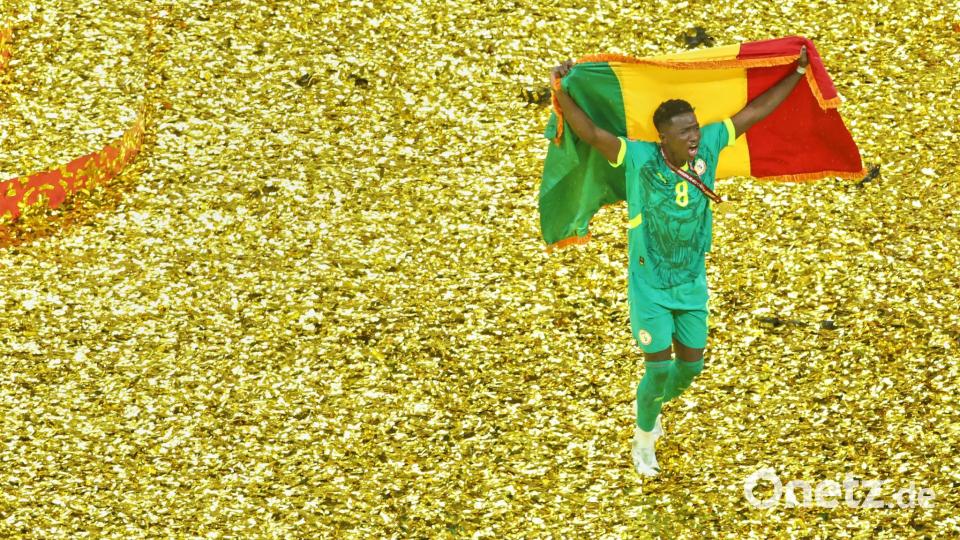 Senegals Lamine Camara jubelt nach dem Sieg gegen Marokko im Afrika Cup. Bild: Youssef Loulidi/AP/dpa