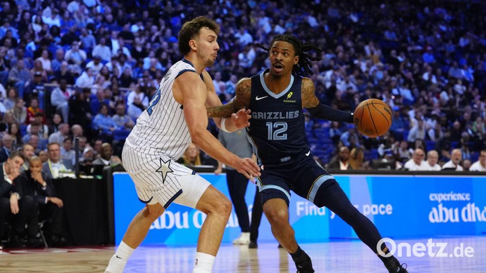 Wagner (links) und die Magic verloren in London gegen die Grizzlies um Morant. Bild: Bradley Collyer/PA Wire/dpa