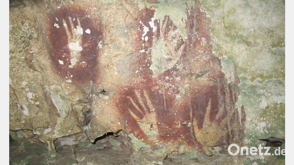 Warum die Finger verschiedener Höhlenkunst nachträglich verschmälert wurden, ist unklar. Bild: Ahdi Agus Oktaviana/Griffith University/dpa
