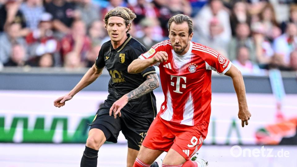 Kane (r) will die Bayern zum nächsten Sieg führen. (Archivbild) Bild: Harry Langer/dpa