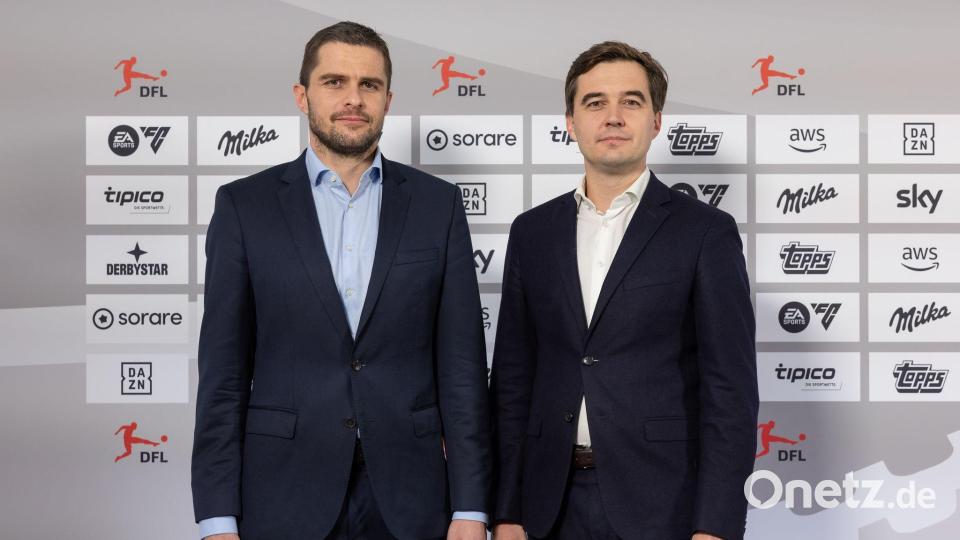 Marc Lenz (l.) und Steffen Merkel: Rekordzahlen beim Wirtschaftsreport der DFL. Bild: Jürgen Kessler/dpa