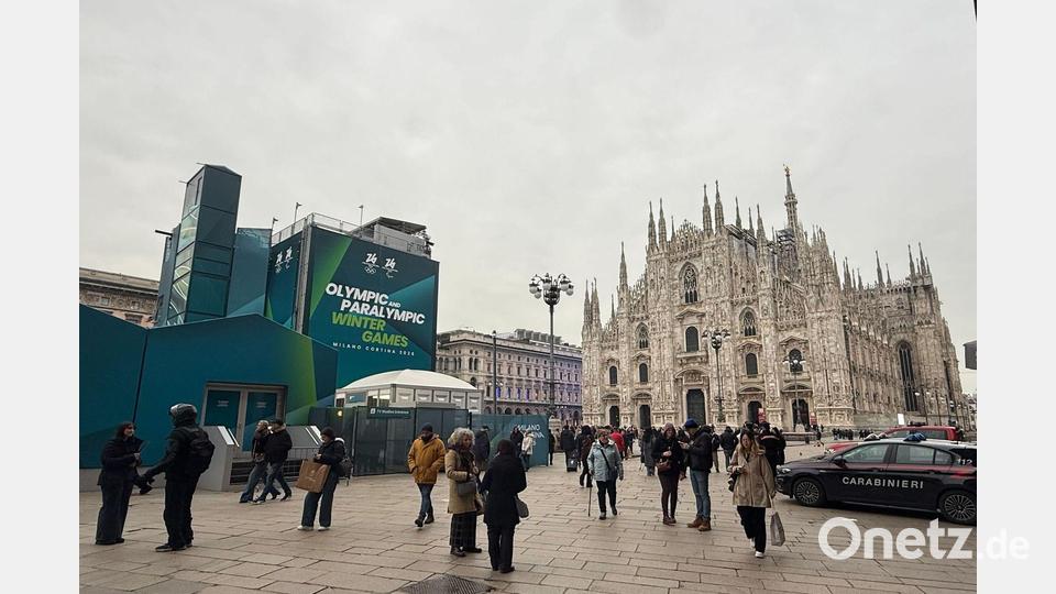 Auf dem Domplatz in Mailand ist noch wenig von Olympiastimmung zu spüren. Bild: Christoph Sator/dpa