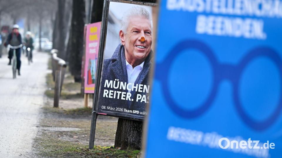 Wahlplakate in München weisen auf die Kommunalwahl am 8. März hin. Bild: Sven Hoppe/dpa