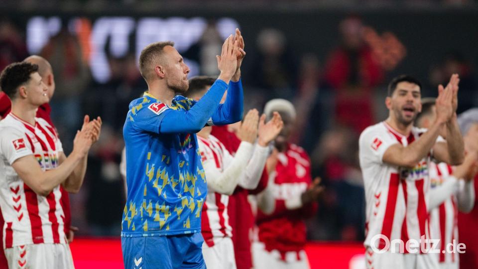 Köln um Torwart Marvin Schwäbe jubelte über den 1:0-Sieg gegen Wolfsburg. Bild: Marius Becker/dpa