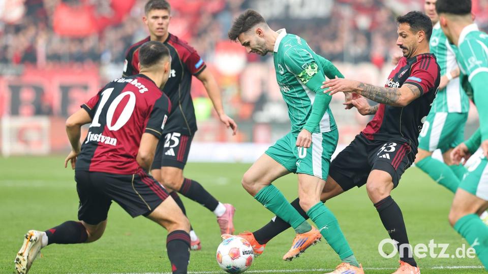Treffen mit Nürnberg auf den Ex-Verein Paderborn: Justvan (l) und Adriano Grimaldi (r). (Archivbild) Bild: Daniel Karmann/dpa