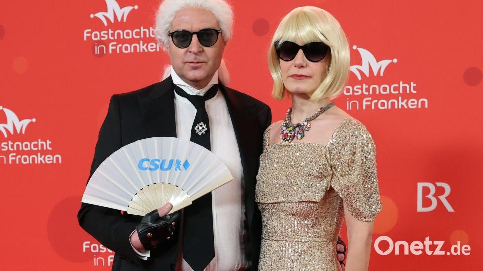 Karl Lagerfeld und Anna Wintour? Nein, CSU-Generalsekretär Huber und seine Frau. Bild: Daniel Löb/dpa