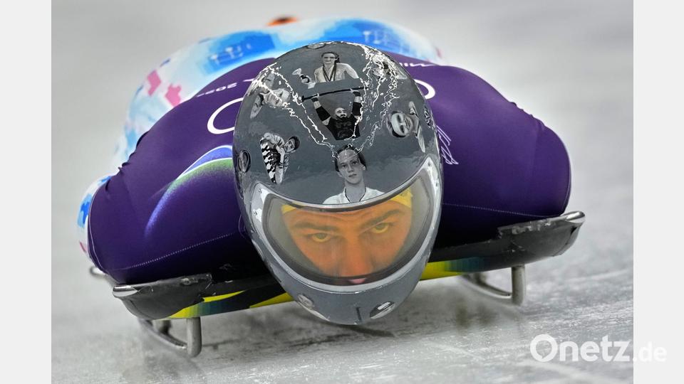 Heraskewytsch erinnert mit besonderen Helm an durch den Krieg gefallene Sportkollegen. Bild: Alessandra Tarantino/AP/dpa