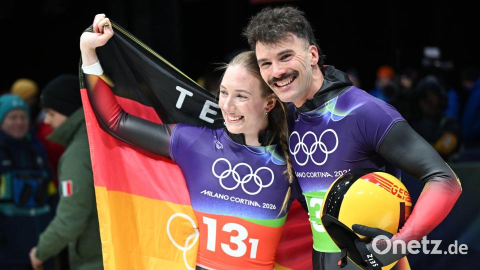 Jubel im Ziel: Susanne Kreher und Axel Jungk gewannen Silber. Bild: Robert Michael/dpa