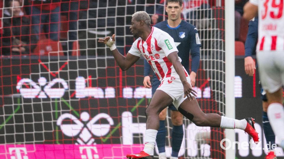 Ragnar Ache jubelt über das Tor zum 1:0. Bild: Marius Becker/dpa