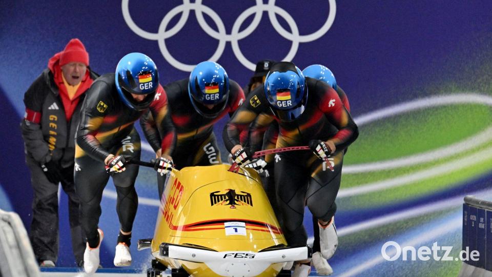 Johannes Lochner (Pilot), Thorsten Margis, Jörn Wenzel und Georg Fleischhauer legten im ersten Lauf Start- und Bahnrekord hin. Bild: Robert Michael/dpa