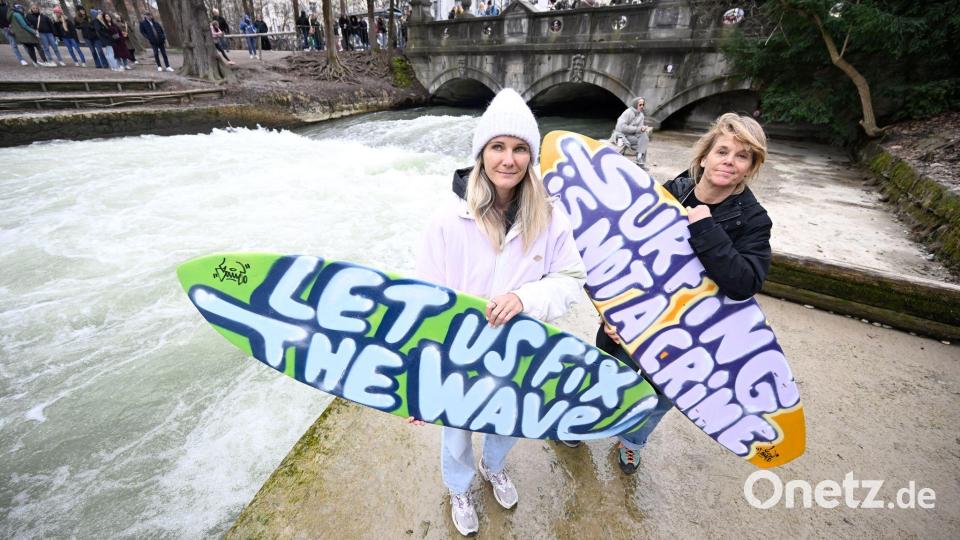 Aufgerufen zu der Kundgebung hatte unter anderem der Surfclub München. Bild: Felix Hörhager/dpa