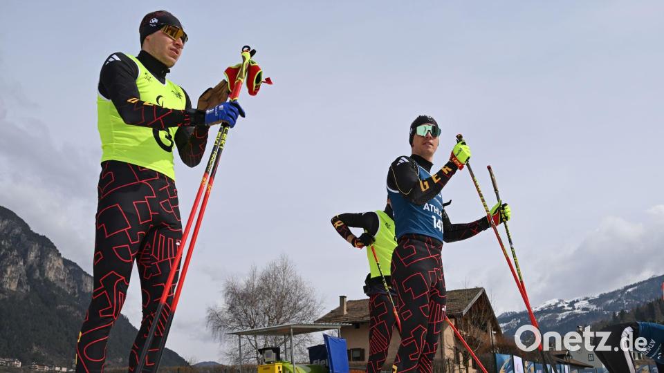 Nico Messinger (r) und Guide Robin Wunderle. Bild: Martin Schutt/dpa