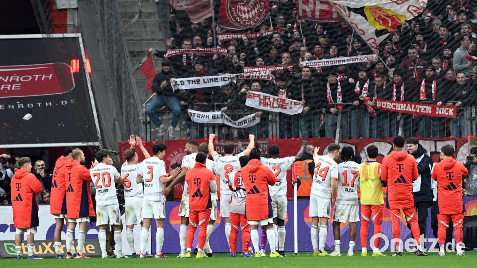 Die Spieler von Bayern München bejubelten das Remis in Leverkusen wie einen Sieg. Bild: Federico Gambarini/dpa
