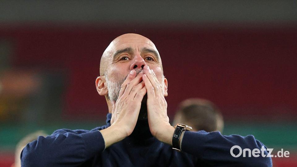 ManCity-Coach Pep Guardiola kostete den Gewinn des Liga-Pokals voll aus. Bild: Richard Pelham/AP/dpa