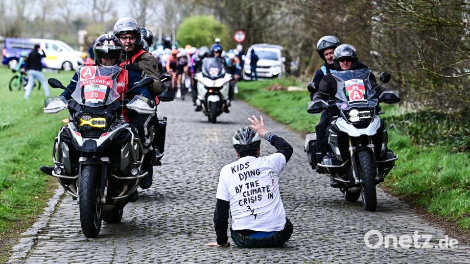 Ein Klima-Demonstrant sorgt für einen Zwischenfall. Bild: Maarten Straetemans/Belga/dpa