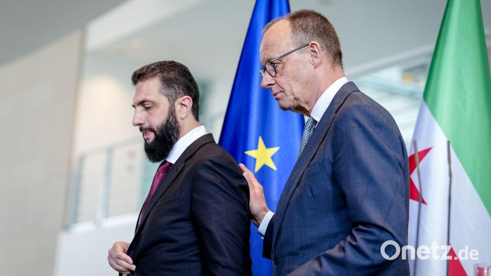 Merz nennt eine Zielmarke für die Rückkehr syrischer Flüchtlinge – und bezeichnet sie als Wunsch des syrischen Präsidenten. Bild: Kay Nietfeld/dpa