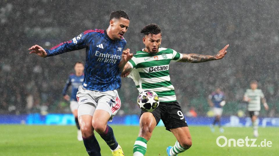 Sporting-Stürmer Luis Suarez (r.) hatte gegen Arsenals Verteidiger einen schweren Stand. Bild: Armando Franca/AP/dpa