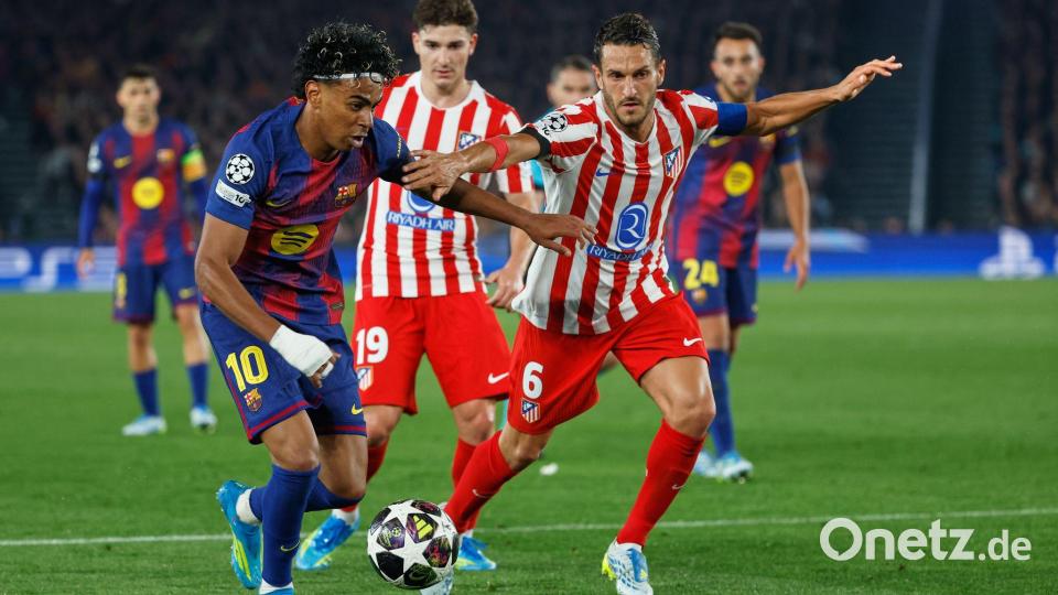 Lamine Yamal (links) und der FC Barcelona lieferten sich ein hitziges Duell mit Atlético Madrid. Bild: Joan Monfort/AP/dpa