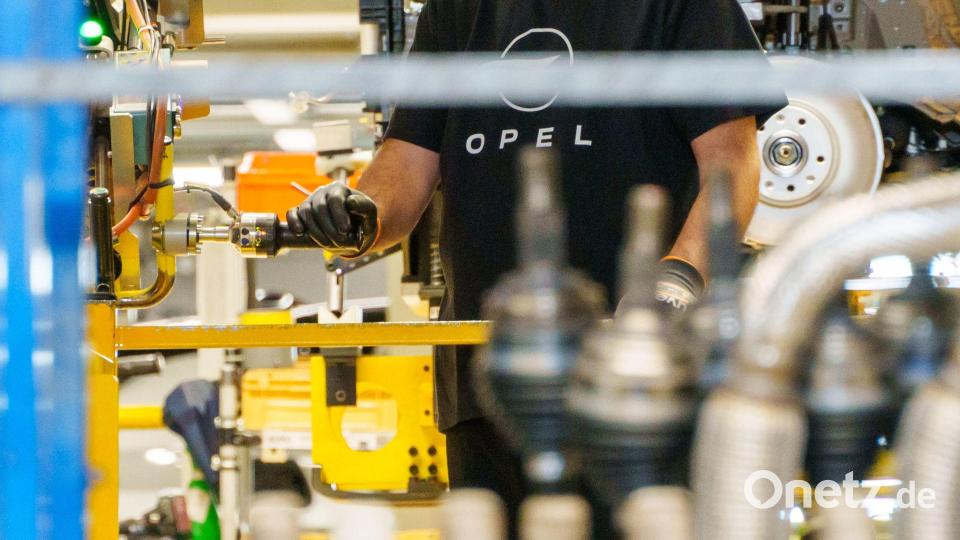 In Rüsselsheim werden auch noch Autos gebaut. Die Entwicklung soll schrumpfen. Bild: Andreas Arnold/dpa