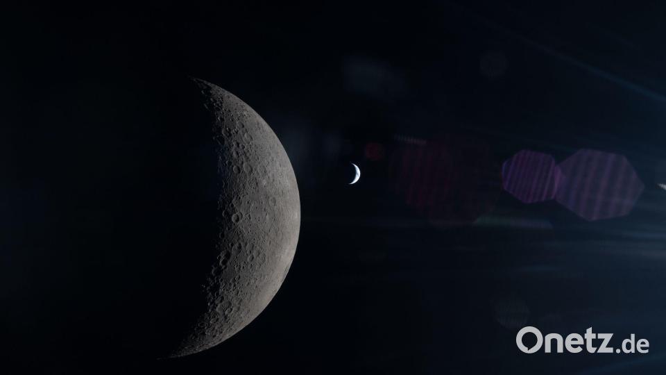 Die Crew hat den Mond intensiv beobachtet. Dahinter ist die Erde zun sehen. Bild: Uncredited/NASA/AP/dpa