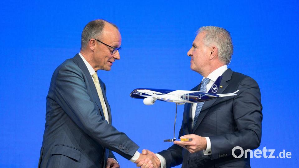 Kanzler Merz und Lufthansa-Chef Spohr. Bild: Hannes P. Albert/dpa
