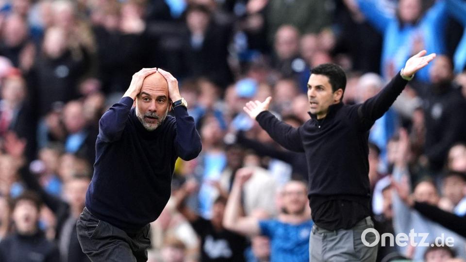 City-Coach Pep Guardiola (l) und Arsenal-Trainer Mikel Arteta. Bild: Martin Rickett/PA/AP/dpa