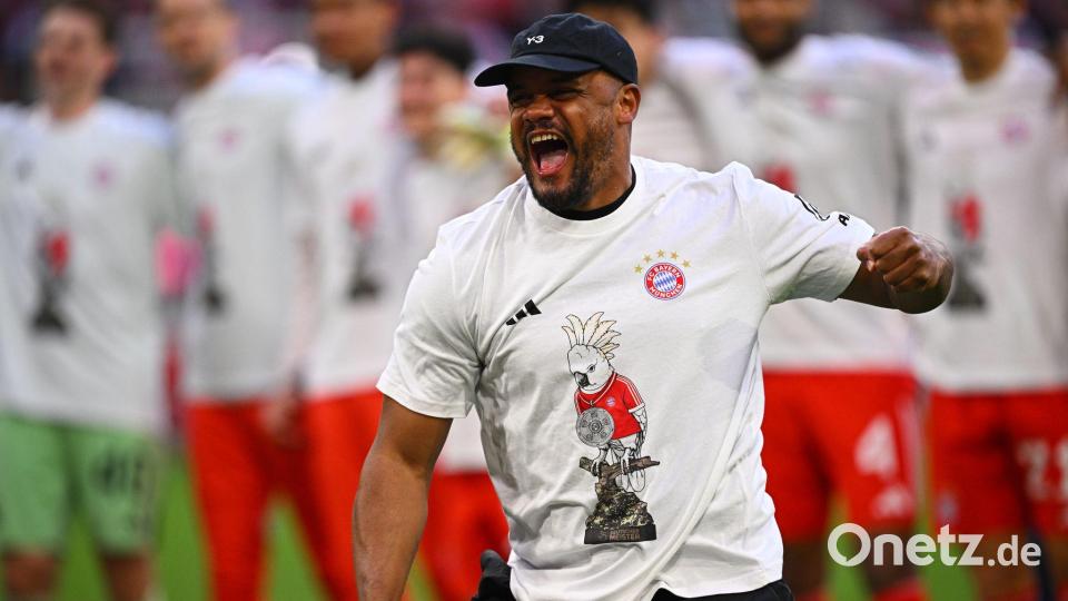 Vincent Kompany feiert die Meisterschaft - Kakadu auf dem Shirt inklusive. Bild: Tom Weller/dpa