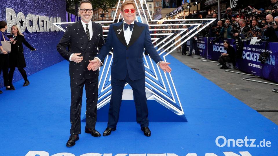 Elton John und sein Mann David Furnish bei einer „Rocketman“-Präsentation im Mai 2019 in London. (Archivbild) Bild: Frank Augstein/AP/dpa