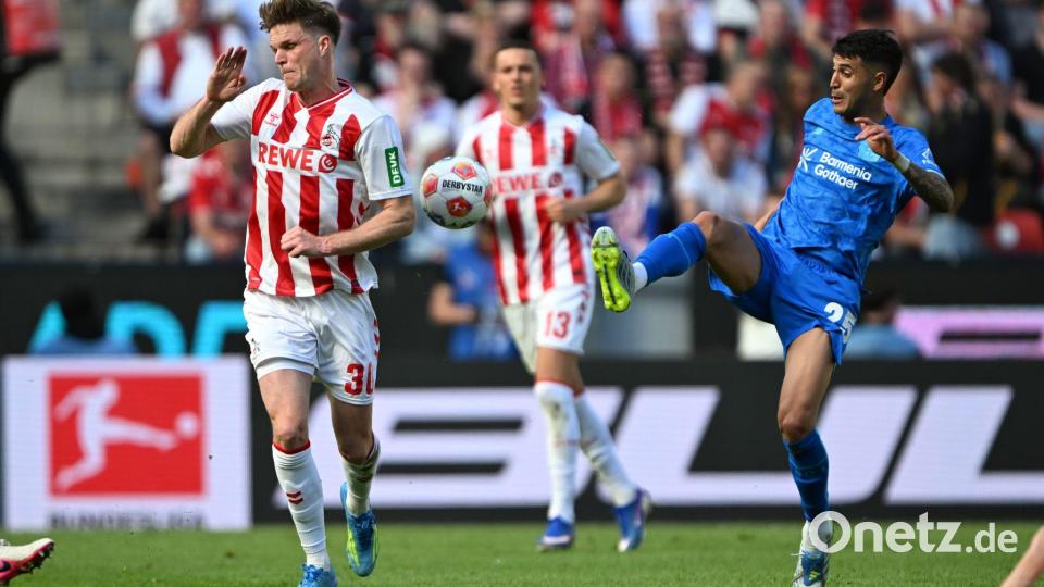 Kölns Marius Bülter im Duell mit Leverkusens Exequiel Palacios. Bild: Federico Gambarini/dpa