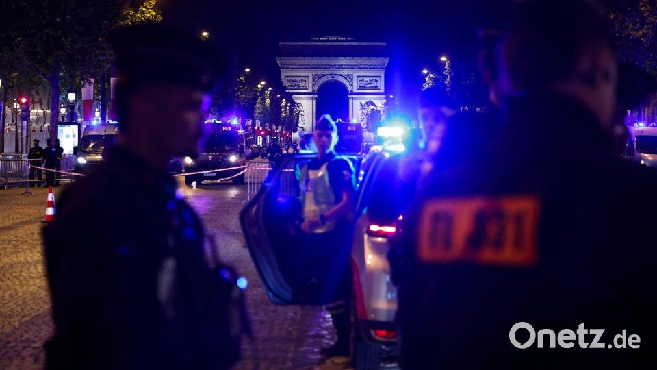 127 Menschen wurden in Paris bei Ausschreitungen festgenommen. Bild: Simon Wohlfahrt/AFP/dpa