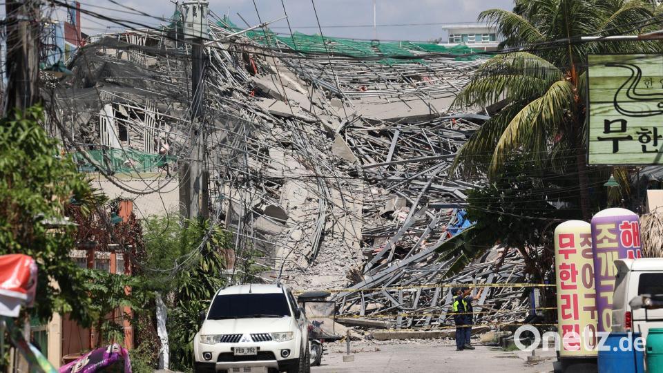 Absperrband markiert den Bereich um ein eingestürztes Gebäude in der philippinischen Provinz Pampanga, nördlich von Manila. Bild: Uncredited/AP/dpa