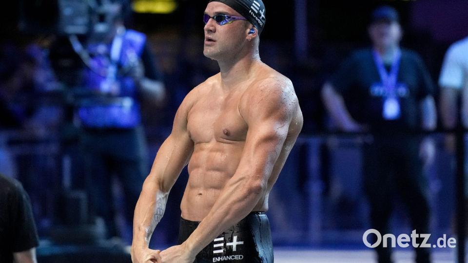 Kusch bejubelte seinen Sieg über 100 Meter Schmetterling mit einer Bodybuilder-Pose. Bild: Jae C. Hong/AP/dpa