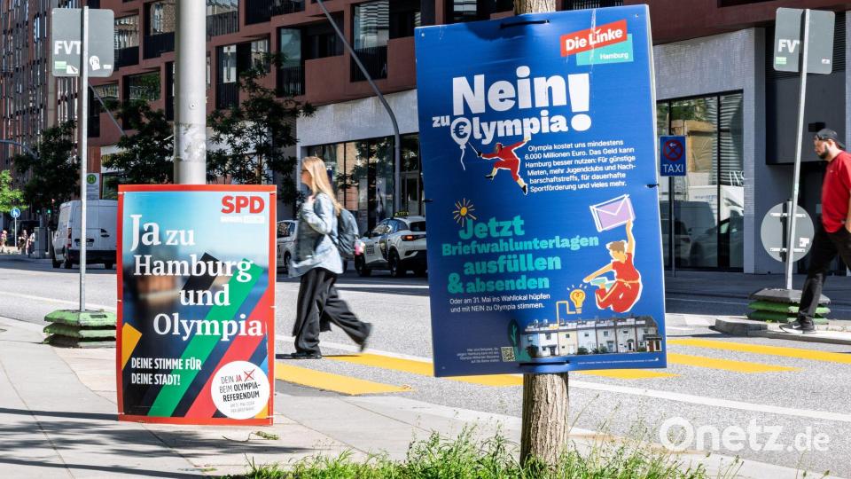 Für das Referendum haben Befürworter und Gegner in der Stadt plakatiert. (Archivbild) Bild: Markus Scholz/dpa